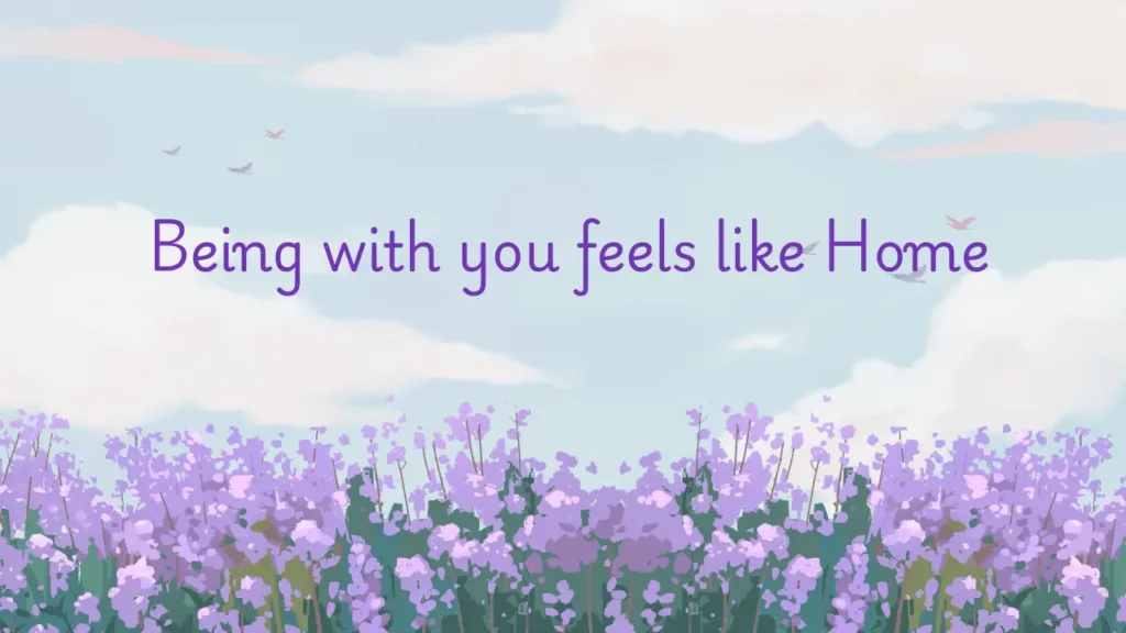 100 Short Love Messages to Send Daily - Fresh Love Texts A romantic message set against a dreamy sky with fluffy clouds and flying birds above a field of purple flowers. The message in dark purple text reads: "Being with you feels like home."